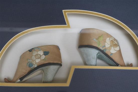 Two framed pairs of silk embroidered Chinese shoes